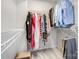Spacious walk-in closet with organized shelving for efficient storage and plush carpet at 582 Sixth Baxter Xing, Fort Mill, SC 29708