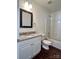 Charming bathroom featuring granite countertop, white vanity, and shower-tub combo at 5905 Waverly Lynn Ln, Charlotte, NC 28269