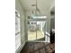 Cozy dining area with sliding glass doors leading to an outdoor patio and yard at 5905 Waverly Lynn Ln, Charlotte, NC 28269