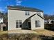 Back of home featuring neutral siding, a patio, and a well-maintained yard at 5905 Waverly Lynn Ln, Charlotte, NC 28269