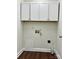 Laundry room including washer hookups, storage, and ventilation at 5905 Waverly Lynn Ln, Charlotte, NC 28269