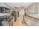 Efficient kitchen layout with essential appliances and neutral color scheme at 6817 Fieldlark Ln, Charlotte, NC 28227