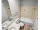 Standard bathroom with a well-lit mirror, sink, toilet, and tub-shower combo at 7140 Stonington Ln, Charlotte, NC 28227