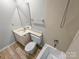 Full bathroom with a vanity, toilet, and shower-tub combo, designed for comfort and practicality at 7140 Stonington Ln, Charlotte, NC 28227