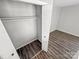 Functional closet with ample hanging space, enhanced by wood-look flooring for added appeal at 7140 Stonington Ln, Charlotte, NC 28227