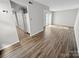 Spacious room featuring wood floors, neutral paint, and ample closet storage for modern living at 7140 Stonington Ln, Charlotte, NC 28227