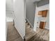 Bright stairway to the next level of the home near the kitchen at 7140 Stonington Ln, Charlotte, NC 28227