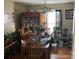 Traditional dining room featuring hardwood floors and plenty of natural light at 7426 Riding Trail Rd, Charlotte, NC 28212
