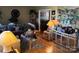 Spacious living room with hardwood floors, neutral walls, and ample natural light at 7426 Riding Trail Rd, Charlotte, NC 28212