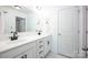 Modern bathroom with dual sinks, black fixtures, and ample counter space at 7672 Tanglewood Way, Denver, NC 28037