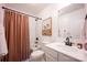 Contemporary bathroom featuring a shower with a dark curtain and a white vanity at 7672 Tanglewood Way, Denver, NC 28037