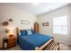 Cozy bedroom featuring hardwood floors, natural light, neutral paint and custom décor at 7672 Tanglewood Way, Denver, NC 28037