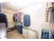 Spacious walk-in closet with ample shelving and storage for clothes and shoes at 7672 Tanglewood Way, Denver, NC 28037