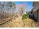 The property has a sprawling lawn with mature trees, and a side sunroom at 8080 Monbo Rd, Catawba, NC 28609