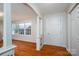 Bright entryway with hardwood floors, white trim, and a window offering natural light at 8080 Monbo Rd, Catawba, NC 28609