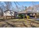 Charming split-level home featuring brick accents, vinyl siding, a welcoming front porch and covered carport at 8080 Monbo Rd, Catawba, NC 28609