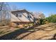 Charming split-level home featuring brick accents, vinyl siding, a welcoming front porch and covered carport at 8080 Monbo Rd, Catawba, NC 28609