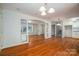 Expansive living area showcasing hardwood floors and seamless transition to other living spaces at 8080 Monbo Rd, Catawba, NC 28609