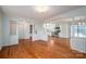 Open-concept living area with hardwood floors, flowing into a kitchen with modern appliances at 8080 Monbo Rd, Catawba, NC 28609