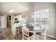 Dining area with wooden table set and bright natural lighting from windows at 8603 Ridgeline Ln, Charlotte, NC 28269