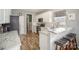 Well-lit kitchen featuring granite countertops, white cabinetry, and stainless appliances at 8603 Ridgeline Ln, Charlotte, NC 28269