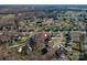 Aerial view showcases the property's location within a quiet residential area at 8822 Crape Myrtle Dr, Stanfield, NC 28163