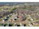 Aerial view showcases the property's location within a quiet residential area at 8822 Crape Myrtle Dr, Stanfield, NC 28163