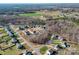 Aerial view showcases the property's location within a quiet residential area at 8822 Crape Myrtle Dr, Stanfield, NC 28163