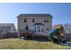 View of backyard featuring play set, deck and mature landscaping at 8822 Crape Myrtle Dr, Stanfield, NC 28163