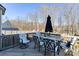 Outdoor deck with patio furniture and backyard view at 8822 Crape Myrtle Dr, Stanfield, NC 28163