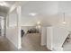 Loft area featuring neutral carpet, open space, and a tranquil reading nook at 8830 Cinnabay Dr, Charlotte, NC 28216