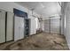 Spacious garage with ample storage cabinets and an automatic door at 908 Dogwood Dr, Gastonia, NC 28054