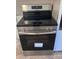 Stainless steel Frigidaire oven with glass cooktop and digital display offers modern kitchen convenience at 908 Dogwood Dr, Gastonia, NC 28054