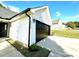 Single-Gathering home with an attached two-car garage and manicured landscaping at 9513 Isaac Hunter Dr, Charlotte, NC 28214
