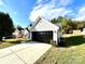 Lovely one-story home with an attached garage, offering ample parking space at 9513 Isaac Hunter Dr, Charlotte, NC 28214