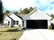 Charming single-Gathering home with a well-maintained lawn and two-car garage at 9513 Isaac Hunter Dr, Charlotte, NC 28214