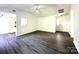 Bright living room featuring modern flooring, neutral walls, and ample natural light at 9513 Isaac Hunter Dr, Charlotte, NC 28214