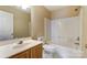 Bathroom featuring a single vanity and a tub/shower combo with neutral walls at 9900 Meadowmead Ct, Charlotte, NC 28273