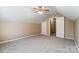 Neutral bedroom features cozy carpet and two doors with passage to other rooms at 9900 Meadowmead Ct, Charlotte, NC 28273