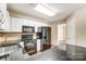 Well-equipped kitchen with sleek black appliances, white cabinets, and dark granite countertops at 9900 Meadowmead Ct, Charlotte, NC 28273