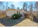 Charming single story house with a ramp leading to the front door, and mature landscaping at 1049 Ramsey St, Stanley, NC 28164
