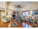 Cozy living room featuring hardwood floors, neutral walls, and comfortable furnishings at 1049 Ramsey St, Stanley, NC 28164