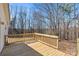 Wooden back deck with wooded view at 109 Fish Hill Dr, Statesville, NC 28677