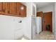Utility room with washer/dryer hookups and additional storage at 109 Fish Hill Dr, Statesville, NC 28677