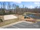 Community playground, pond, and volleyball court offer recreational amenities for residents to enjoy at 1189 Sandy Bottom Nw Dr, Concord, NC 28027