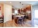 Modern kitchen featuring granite countertops, stainless steel appliances, dark cabinetry, and a center island at 1232 Scotch Meadows Loop, Monroe, NC 28110