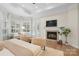 Tranquil main bedroom featuring a fireplace and a bay window seating area at 133 Crooked Branch Way, Troutman, NC 28166