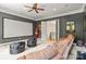 Home theater room with a large screen, comfortable seating, and cinematic ambiance at 133 Crooked Branch Way, Troutman, NC 28166