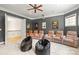 Comfortable movie room featuring reclining seats, ambient lighting, and a projector at 133 Crooked Branch Way, Troutman, NC 28166
