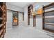 Spacious walk-in closet featuring custom shelving and ample storage for clothing and accessories at 133 Crooked Branch Way, Troutman, NC 28166